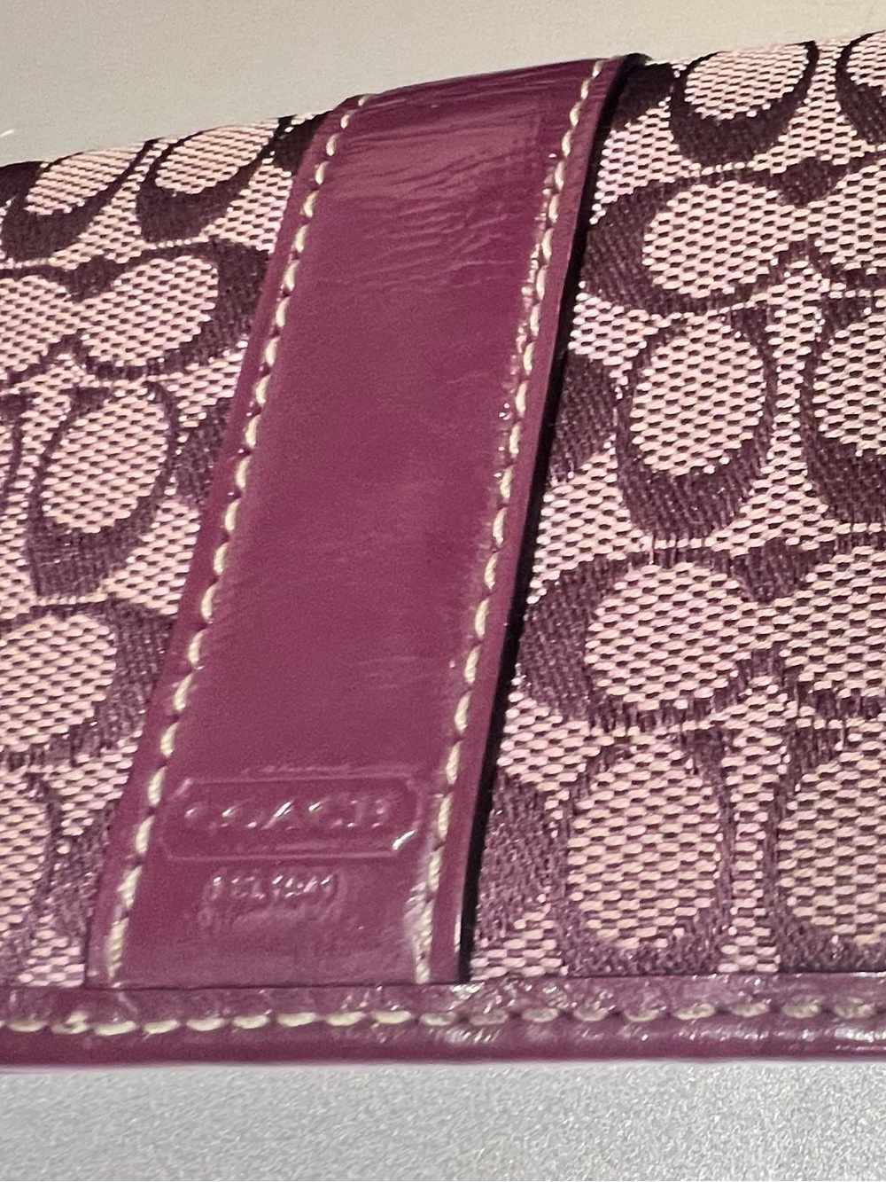 Coach Signature Canvas wallet in Plum